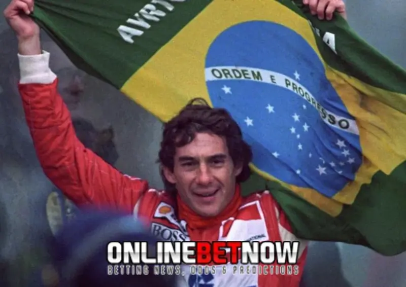 Ayrton-Senna holding the brazillian flag