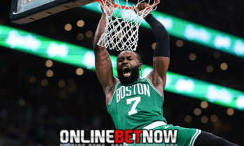 jaylen brown of boston celtics dunking in a game with miami heat