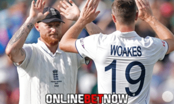 ben stokes and chris wokes of england giving high five to each other